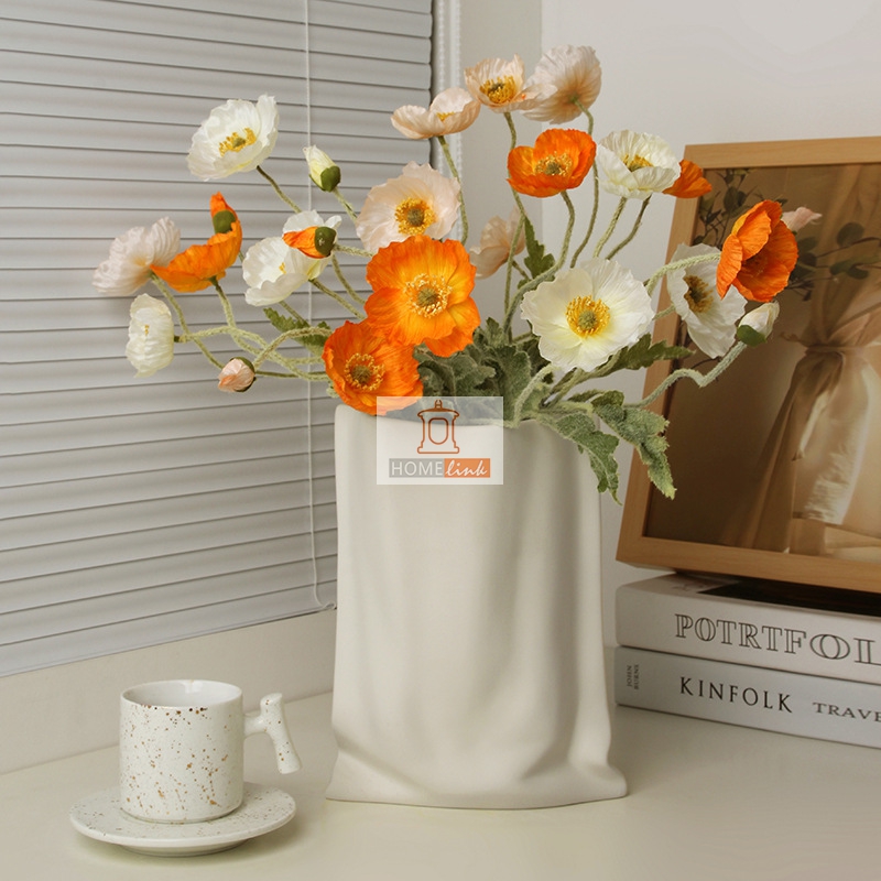 Hand held texture vase with paper bag design