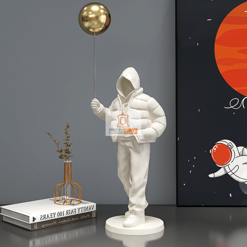 Creative light luxury style character holding balloon style ornaments