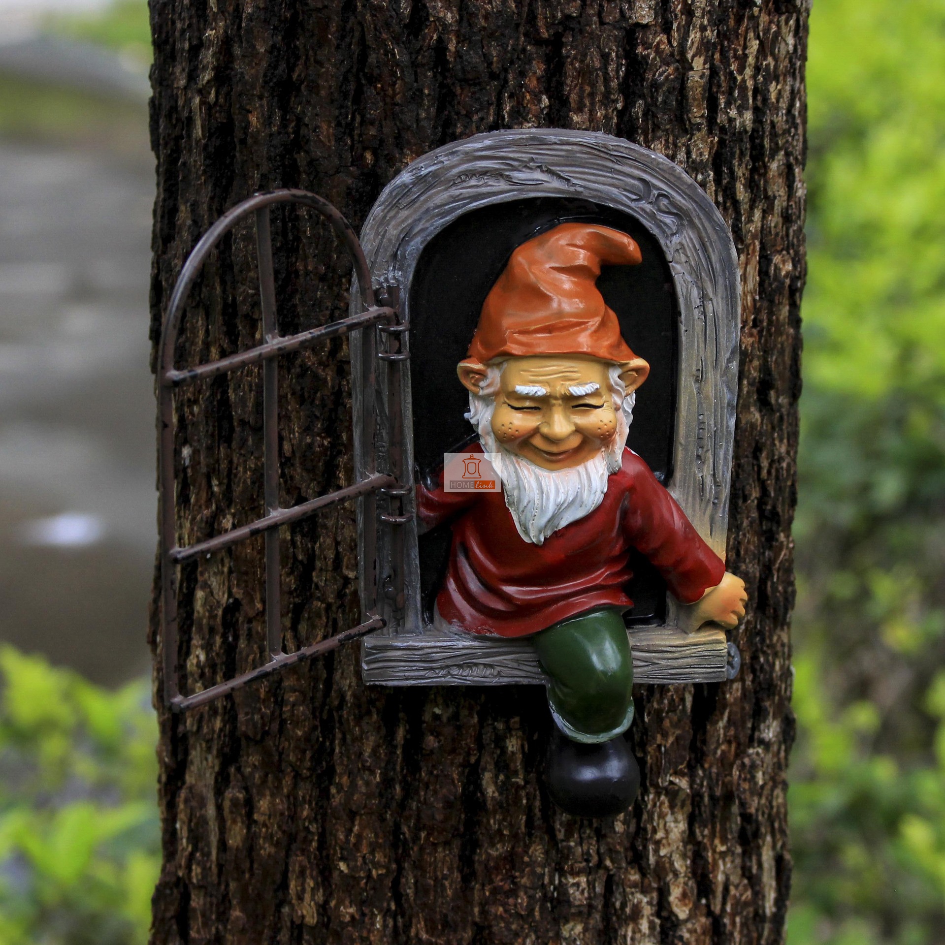 Window climbing ornament for the white bearded dwarf in the garden